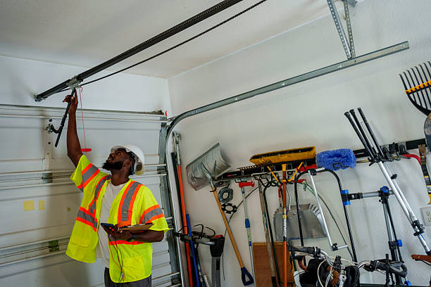 Professional Garage Door Panel Replacement technician working in Greenfield, IN